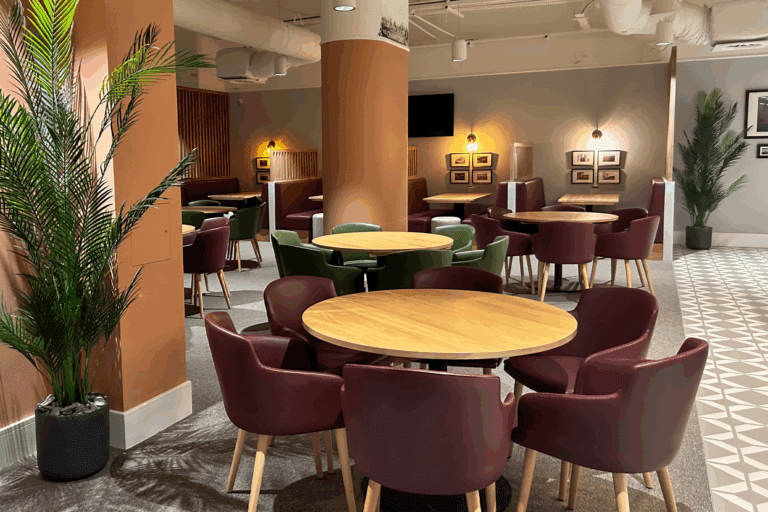 Allianz Stadium Grand Slam hospitality suite dining and booth seating area